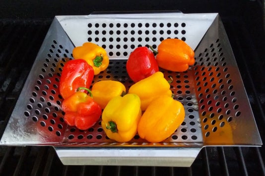 Grillux Grill Basket with peppers inside.